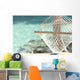 Travel concept with a hammock in a tropical beach Wall Mural