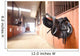Leather saddle horse Wall Mural