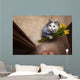 cat with a bouquet at the feet of mistress Wall Mural