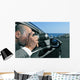 detective or paparazzi taking photos from inside a car Wall Mural