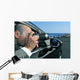 detective or paparazzi taking photos from inside a car Wall Mural