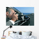 detective or paparazzi taking photos from inside a car Wall Mural