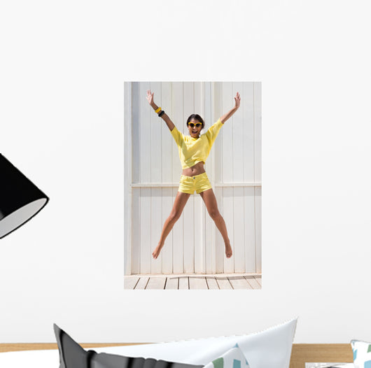 Happy Woman Jumping Wall Mural