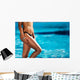 Girl with beautiful body by the swimming pool Wall Mural