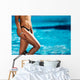 Girl with beautiful body by the swimming pool Wall Mural