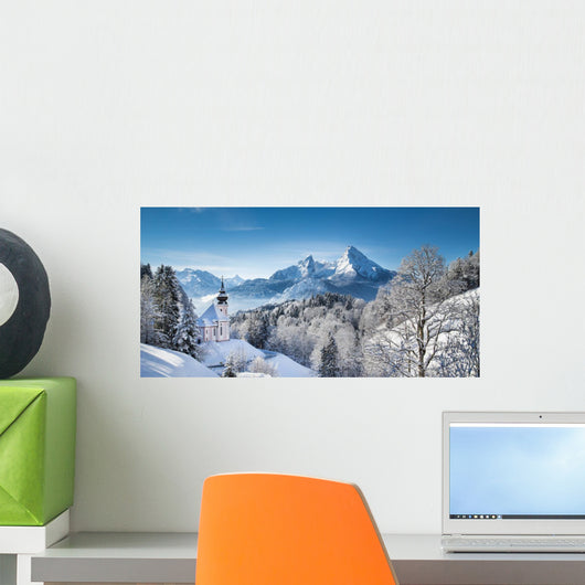 Winter landscape in the Alps with church Wall Mural