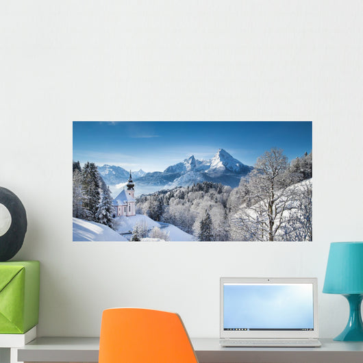 Winter landscape in the Alps with church Wall Mural