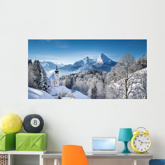 Winter landscape in the Alps with church Wall Mural