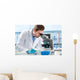 Scientist Looking through Microscope Wall Decal