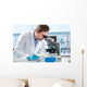 Scientist Looking through Microscope Wall Decal