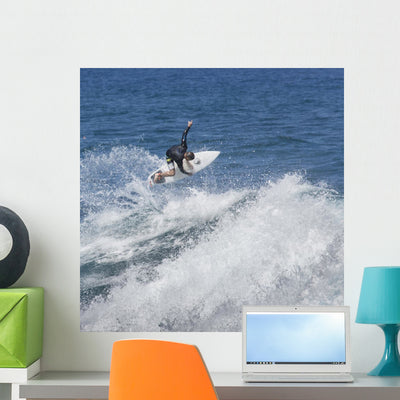 Extreme Surfer Riding Giant Wall Decal shown on a wall