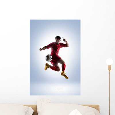 Soccer Player Action Wall Decal shown on a wall