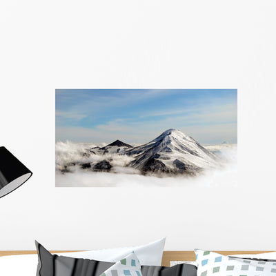 Peaks Mountains above Clouds Wall Decal shown on a wall