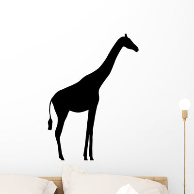 Giraffe Silhouette Wall Decal shown on a wall