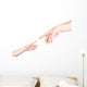 Small Child's Hand Reaches Wall Decal