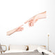 Small Child's Hand Reaches Wall Decal
