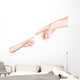 Small Child's Hand Reaches Wall Decal