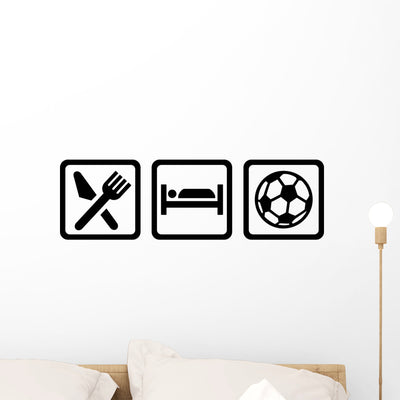 Eat Sleep Soccer Football Wall Decal shown on a wall