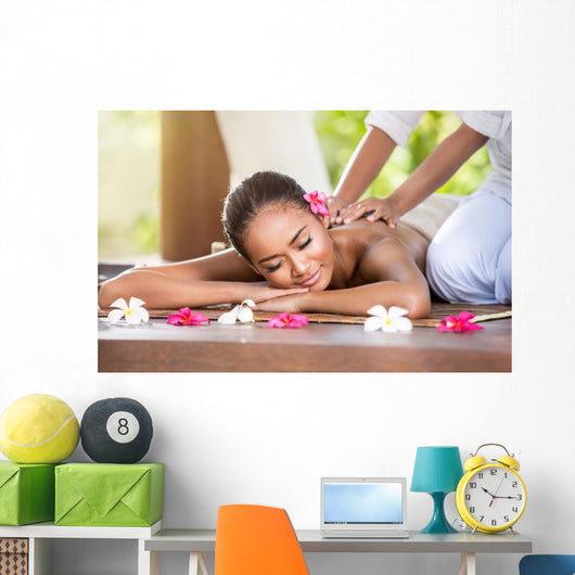 Smiling Woman Enjoying Massage Wall Decal