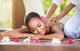 Smiling Woman Enjoying Massage Wall Decal
