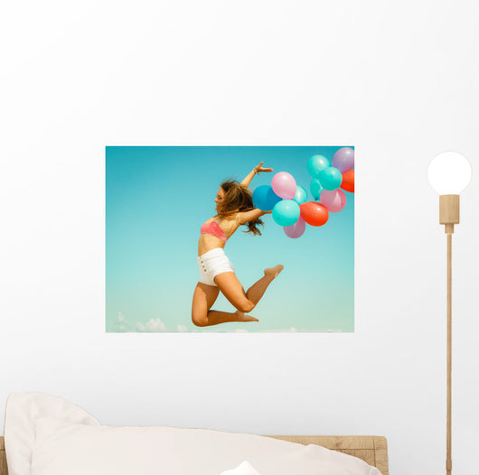Girl Jumping with Colorful Wall Decal