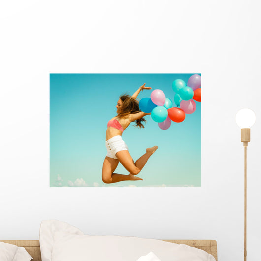 Girl Jumping with Colorful Wall Decal
