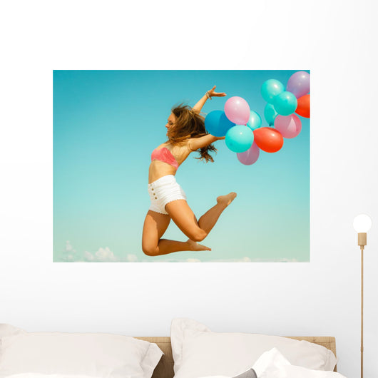 Girl Jumping with Colorful Wall Decal