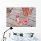 Girl Putting Coral Sandals Wall Decal