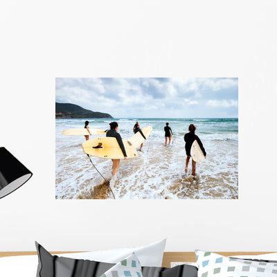 Unidentified Surfers with Surfing Wall Decal shown on a wall