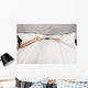 Man Hiding Bed under Wall Decal