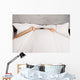 Man Hiding Bed under Wall Decal