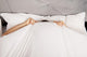 Man Hiding Bed under Wall Decal