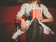 Young Woman Sitting Movie Wall Decal