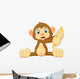 Cartoon Monkey Holding Banana Wall Decal