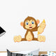 Cartoon Monkey Holding Banana Wall Decal