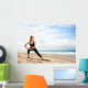 Sportswoman Doing Exercises Beach Wall Decal