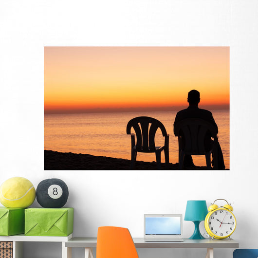 Man Sits Chair Alone Wall Decal