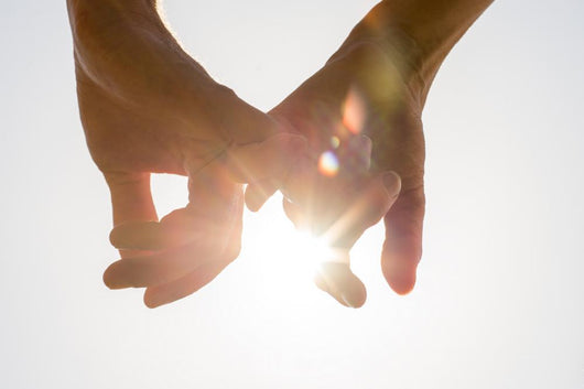 Couple Holding Hands toward Wall Decal