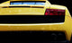 Modern fast car close-up background. Luxury, expensive Wall Mural