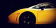 Modern fast car close-up side view on black. Luxury Wall Mural