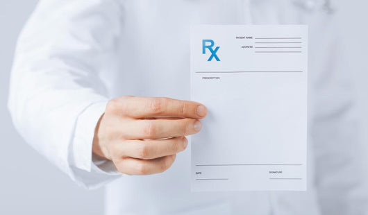 Male Doctor Holding Rx Wall Decal