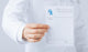 Male Doctor Holding Rx Wall Decal