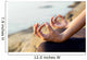 The woman meditating in a yoga pose on the tropical beach. Wall Mural