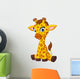Cartoon Baby Giraffe Sitting Wall Decal