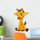 Cartoon Baby Giraffe Sitting Wall Decal