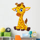 Cartoon Baby Giraffe Sitting Wall Decal