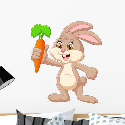 Cartoon Happy Rabbit Holding Wall Decal shown on a wall