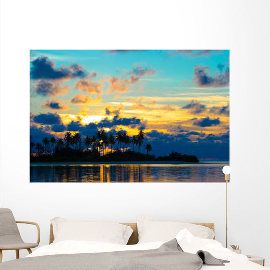 Dark silhouettes of palm trees and amazing cloudy sky at sunset Wall Mural