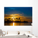 Dark silhouettes of palm trees and amazing cloudy sky at sunset Wall Mural
