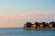 Water villas, bungalows on ideal perfect tropical island Wall Mural